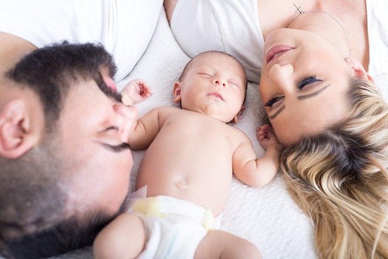 baby photoshoot with parents