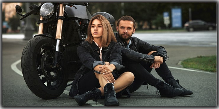 Romantic picture with a couple of beautiful young bikers Stock Photo by  ©czamfir 116261838